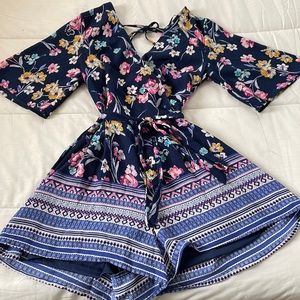Francesca’s blue floral romper